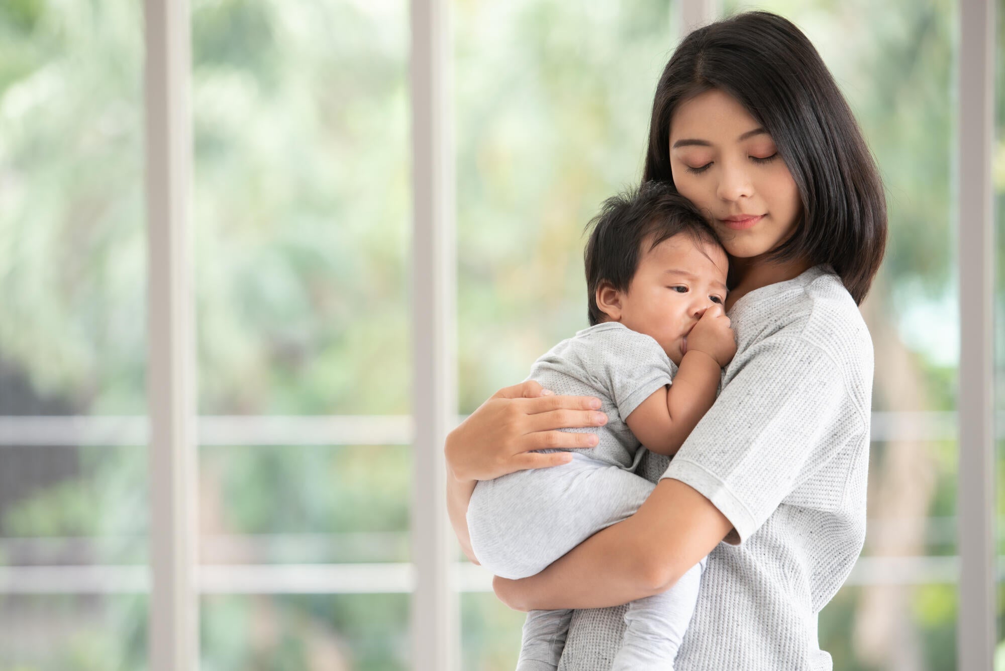 Newborn Wants to Be Held All Night? Here's Why It Happens (and What to Do)